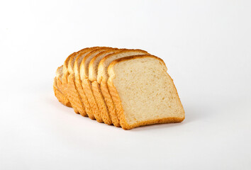 Slicing white wheat bread on a white background.