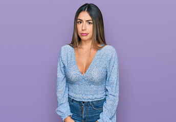 Young hispanic woman wearing casual clothes skeptic and nervous, frowning upset because of problem....