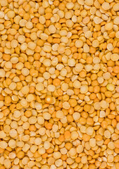 Food background of healthy dried yellow peas