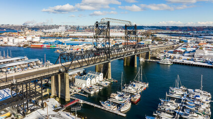 Aerial view of the Port of Tacoma Bridge with industrial buildings in the background