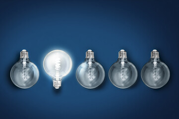 business ideas bulbs electric and a light as a concept of the new business ideas blue	