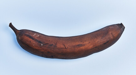  SIngle ripe bananas over blue background
