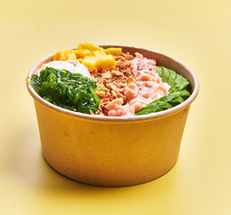  Single poke bowl over yellow background