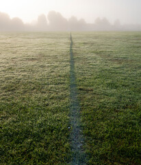 Barcombe village football pitch on a misty dawn