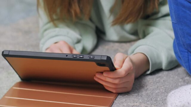 Children playing gadgets close up