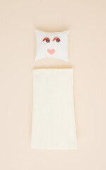 Pillow and blanket. Funny Valentine's Day or Love  concept. Minimal, flat lay.