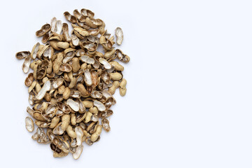 Peanut shells on white background.