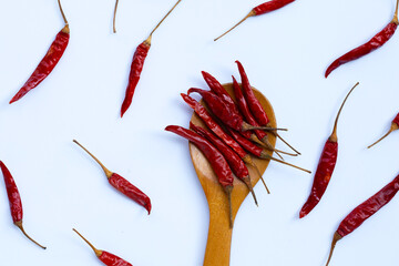 Dried red chili pepper on white background.