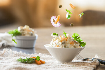 flying or levitation ingredients for russian potato salad olivier or olivyer served for meal,...