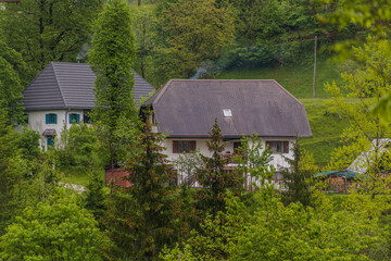 Houses in Soca river valley near Bovec village, Slovenia