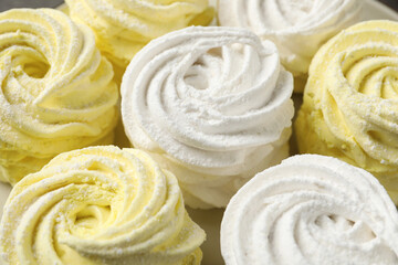 Many white and yellow delicious zephyrs, closeup