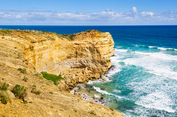 Tourists admire the iconic Twelve Apostles from the Castle Rock lookout - Port Campbell, Victoria,...