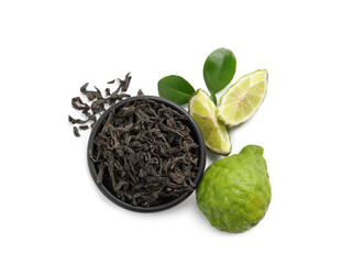 Dry bergamot tea leaves and fresh fruits on white background, top view - obrazy, fototapety, plakaty