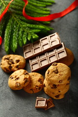 Oven fresh  homemade c=organic chocolate chips cookies- traditional Christmas recipes background.