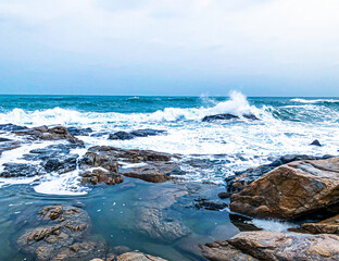 Huge waves crashing against the coast