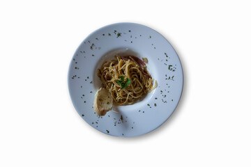 Spaghetti Aglio Olio on a white background. Top view