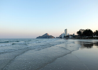 Beach, sand and sea in summer. Khao Takiab beach, Hua Hin, Thailand. Vanilla sky over the sea.