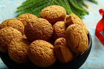 Delicious homemade Christmas cookies, on a holiday background.