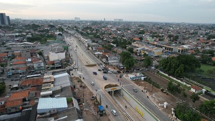 Fototapeta premium Traffic on the streets of Bekasi. Has the highest number of motor vehicles and the traffic congestion is limited in few areas. Bekasi, Indonesia, January 2, 2021