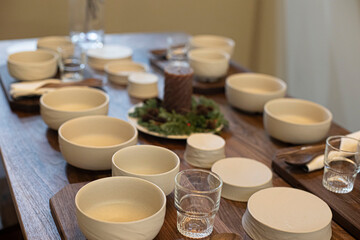 Korea Empty white ceramic bowls on wooden table background.