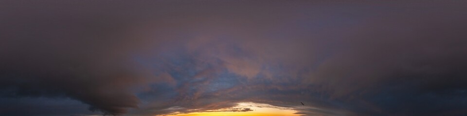 Dramatic sunset sky panorama with Cumulus clouds. Seamless hdr 360 pano in spherical equirectangular format. Complete zenith for 3D visualization, game and sky replacement for aerial drone panoramas