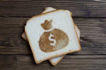 toast with a sign of prosperity on dark wood.