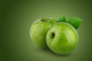 Fresh green apple isolated on green background.