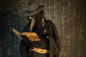 Plague doctor with a syringe of medicine or poison