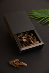 A black box containing agarwood