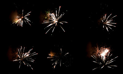 Textures of festive fireworks and bright particles on a black background - 477936078
