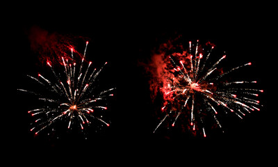 Textures of festive fireworks and bright particles on a black background - 477936079
