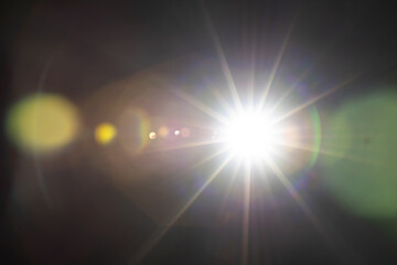 Sun flare on the black background