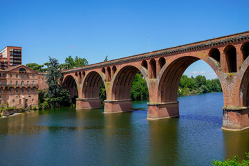 Albi old red brick stone bridge over Tarn river in France