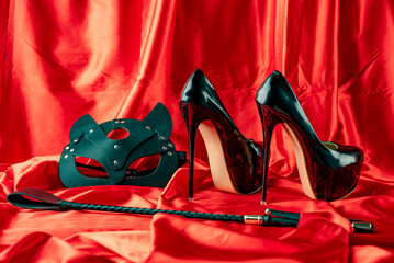 Adult sex games. BDSM items. Patent Fetish Extreme High Heel Stiletto Heels catr mask and whip on a...