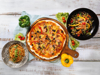 traditional food set platter for lunch table Supreme Pizza, Walnut Cranberry Salad, Aglio Olio.