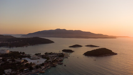 Typical Albanian landscape on the Adriatic shore with mountains. Sunny morning in Albania, Europe. Traveling concept background.