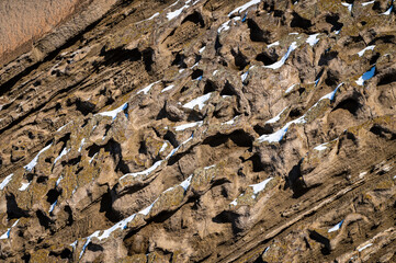 Texture rock wall with snow