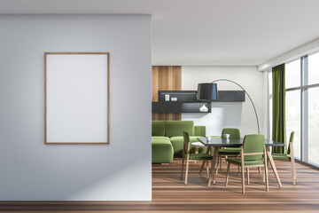 Fototapeta White and green dining room with frame on wall in entrance hall obraz