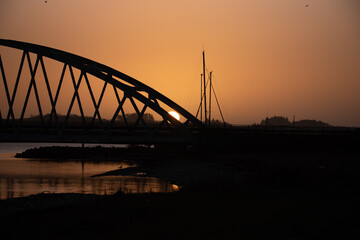 Fototapeta na wymiar Vilsund broen solopgang Sun Rice 