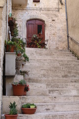 Fototapeta na wymiar borgo antico veduta delle scale e piante