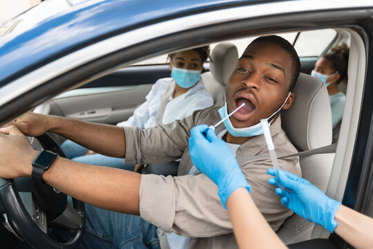 African American Family Getting Tested For Covid-19 Sitting In Car
