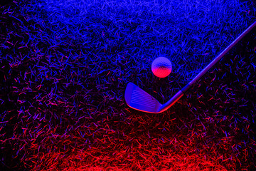 Golf stick and white ball on grass with neon lighting. Blue neon banner. Horizontal sport theme...