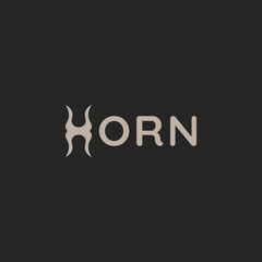 A flat, simple, and minimalist typography design of a word Horn