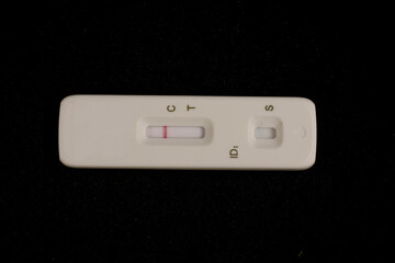 A Rapid Lateral Flow test tray showing a negative result
