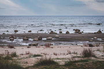 Baltic sea beach in Riga gulf with huge granite boulders