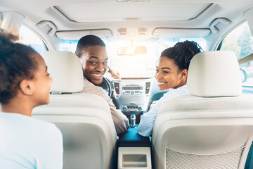 Fototapeta Happy Black Family Of Three Enjoying Car Ride During Summer obraz