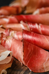 Closeup view of slices of prosciutto ham