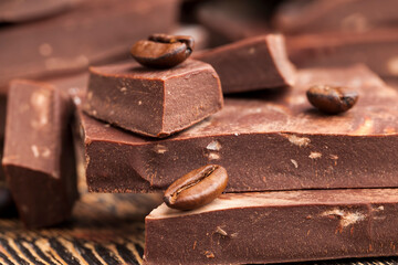 coffee and pieces of milk chocolate from cocoa