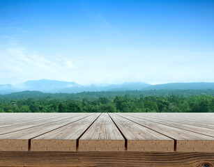 Fototapeta na wymiar Wooden table terrace with a refreshing atmosphere in the morning, natural landscape