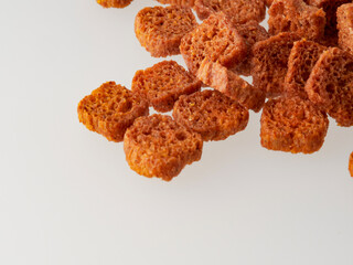 a piece of brown bread cookies on a white background